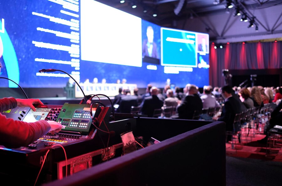 technician handling lights conference 665346 114751