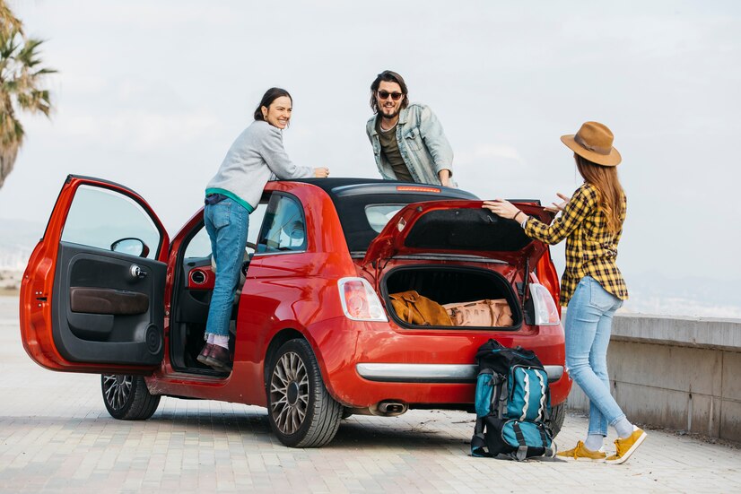 woman man leaning out from car near lady with backpack near car trunk 23 2148039098